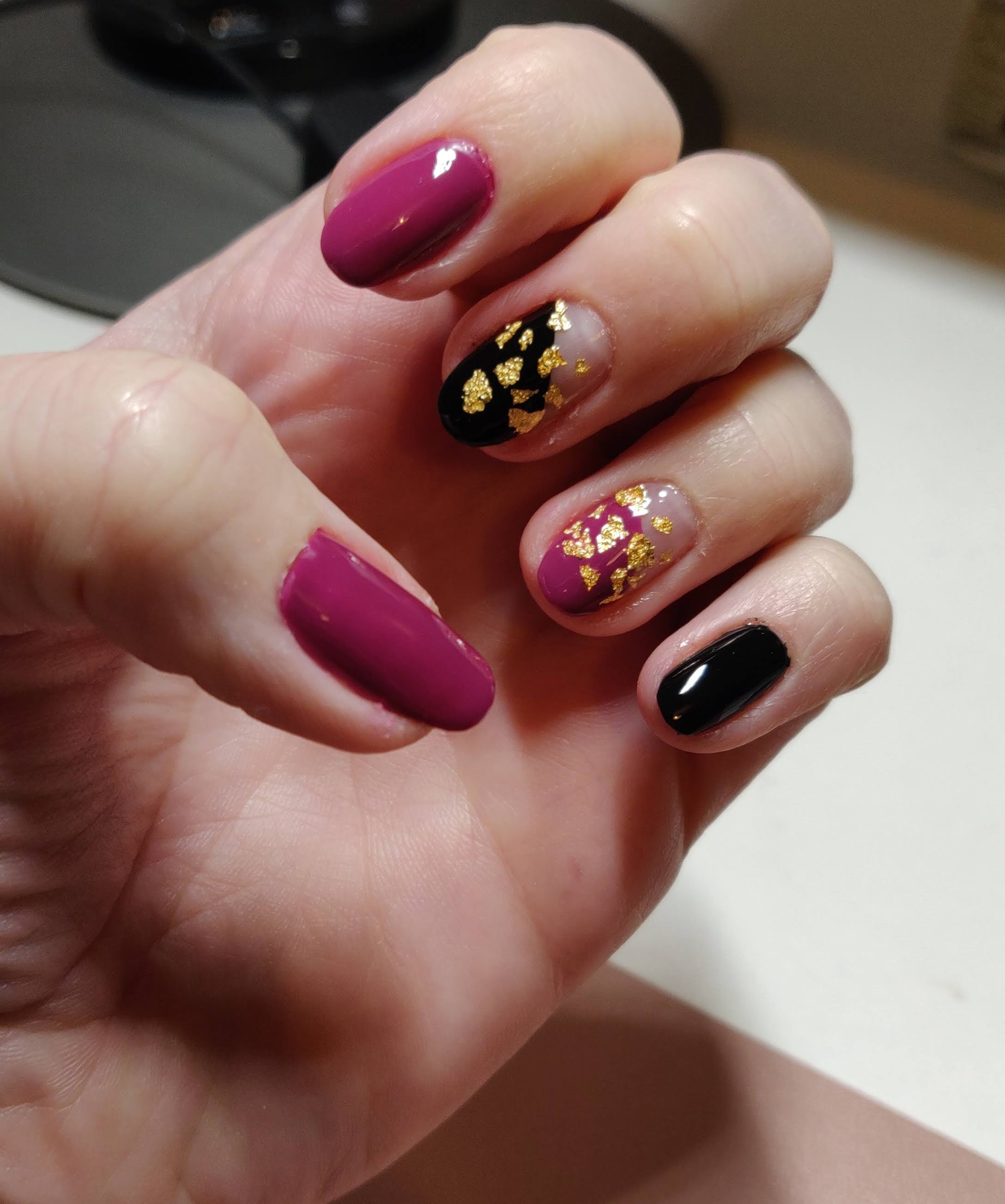 Gold flakes nail art